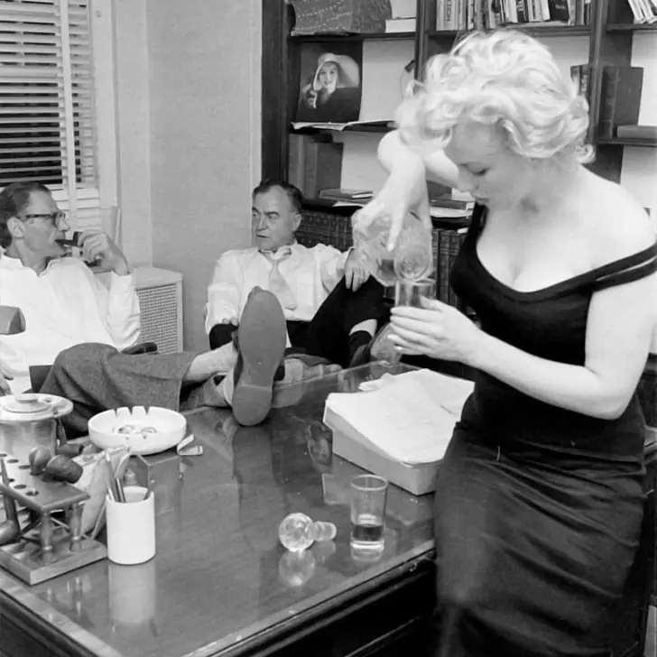 Marilyn Monroe Pouring Herself A Drink in 1958